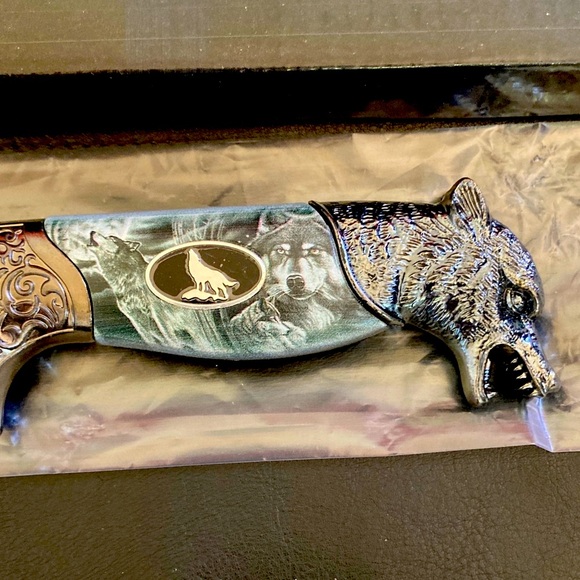 Ornate Silver and Black Decorative Knife
